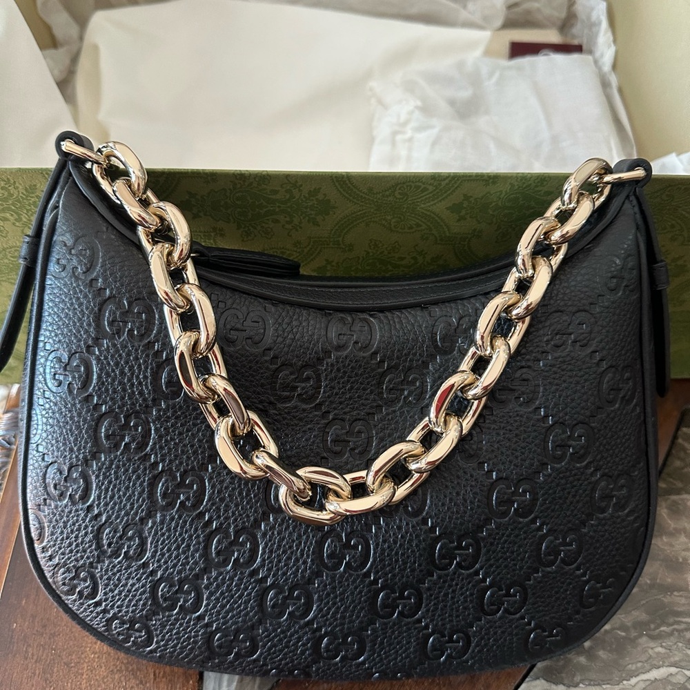 Gucci Embossed Black Shoulder Bag with Gold Chain